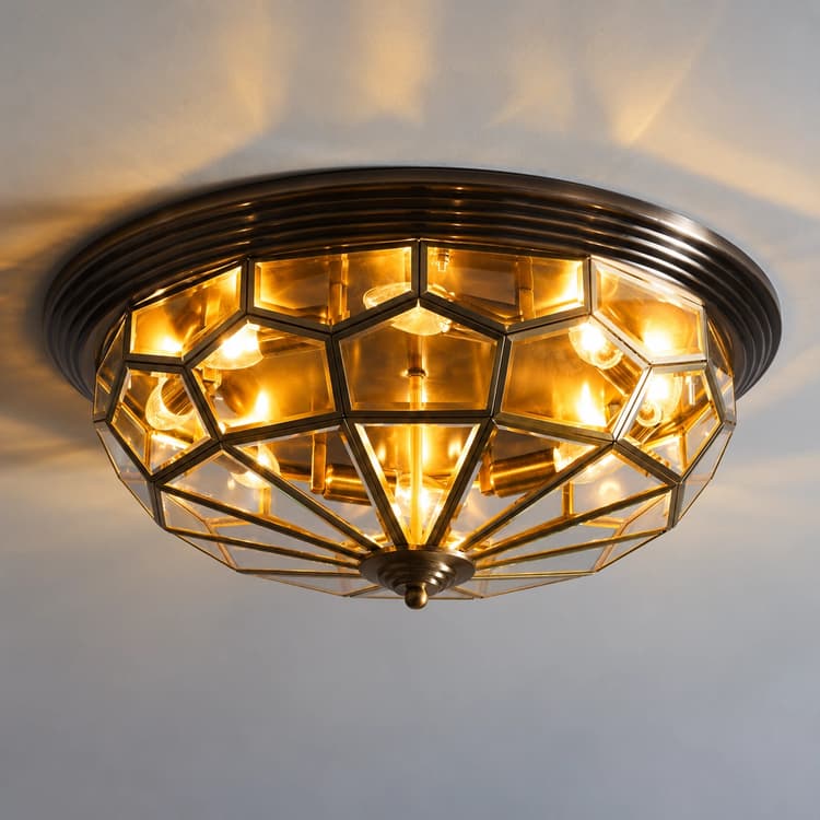 Tiffany style stained glass semi flush ceiling light with amber geometric glass panels and antique bronze metalwork