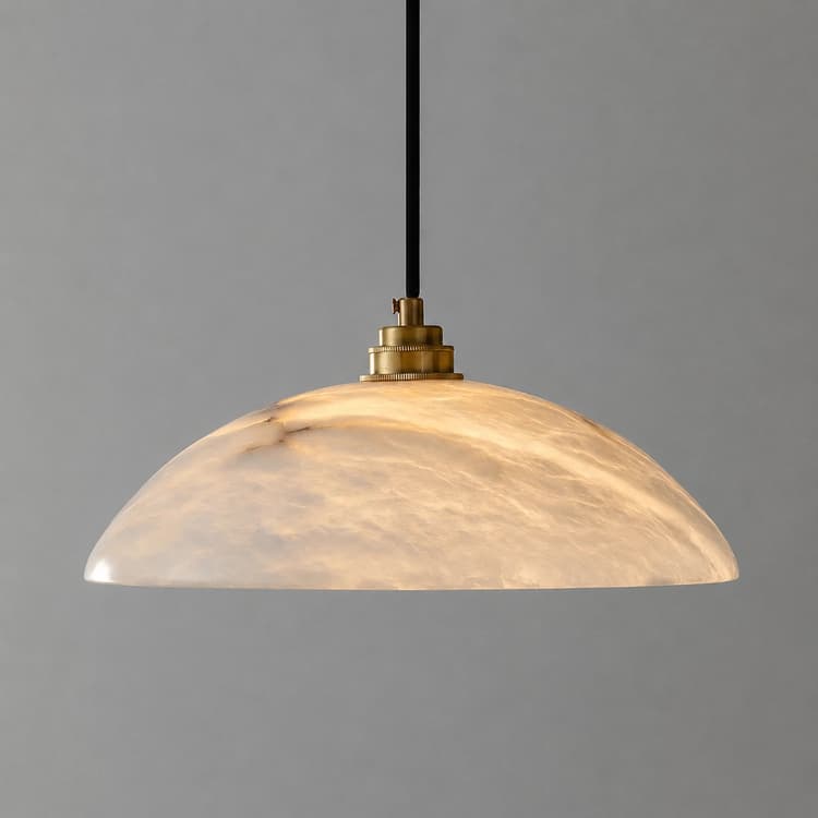 Illuminated natural alabaster dome pendant light with open bottom and warm diffused glow