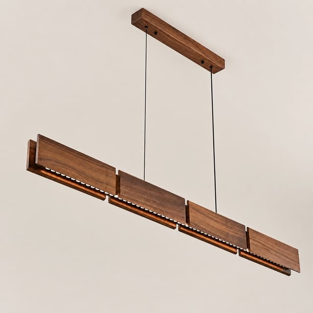 Walnut wood linear LED pendant showing concealed optical light modules beneath the layered wood panels