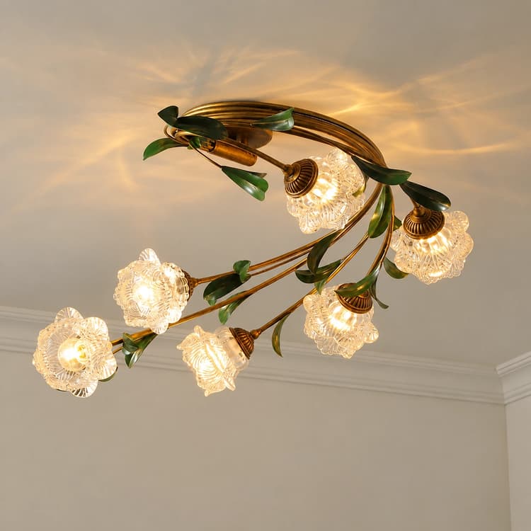 Vintage gold floral ceiling light with six glowing white flower shaped glass shades and green metal leaves