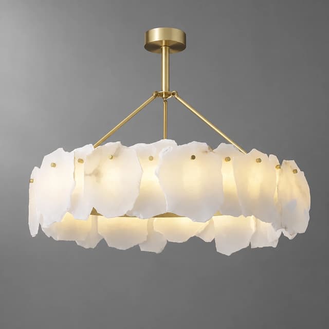 Illuminated natural alabaster and brass chandelier with layered organic stone panels and warm sculptural glow