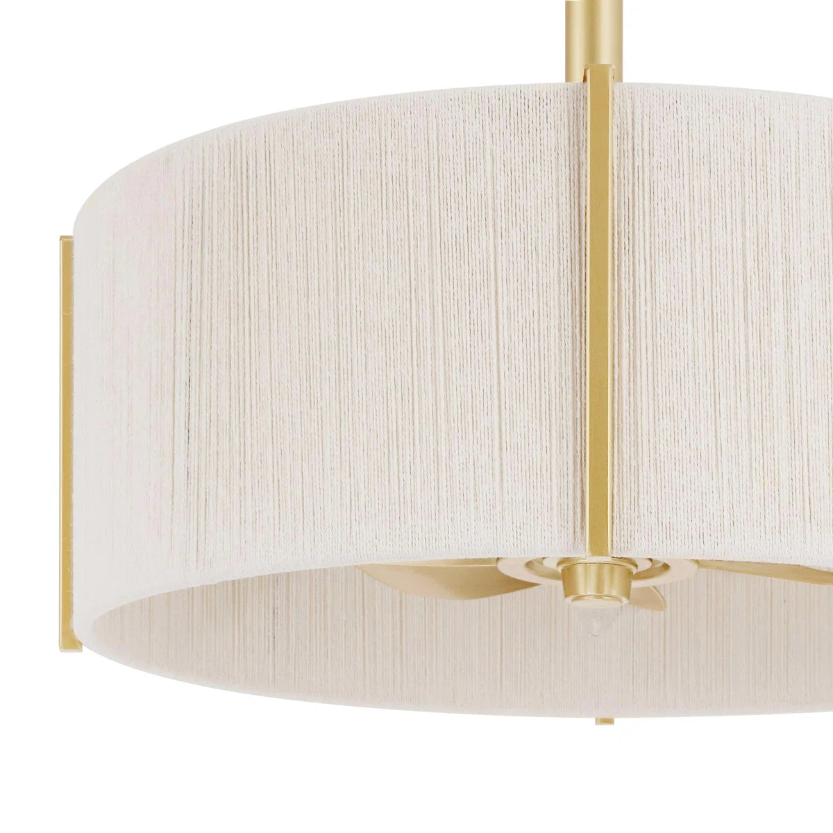 Close-up of brushed gold metal finish and white cotton thread shade