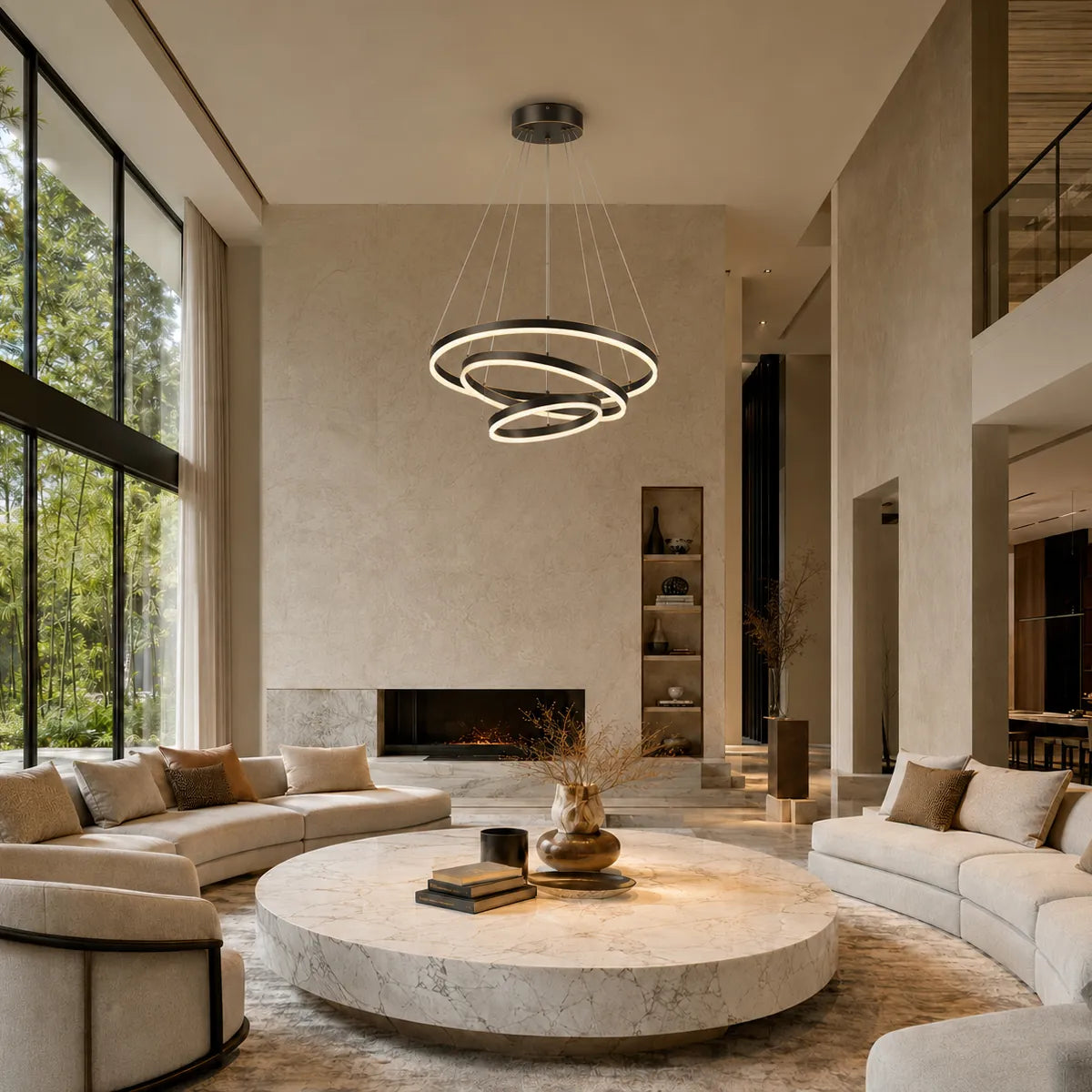 Three-ring LED chandelier suspended in a high-ceiling modern living room with soft ambient light