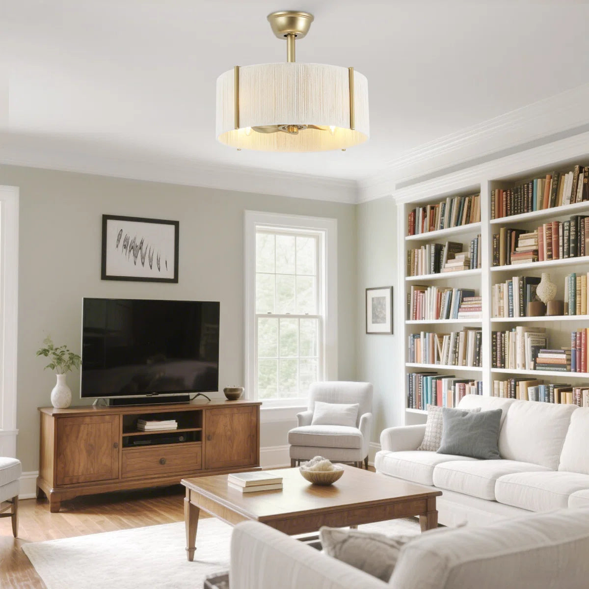 Gold boho fandelier with light installed in a French country living room