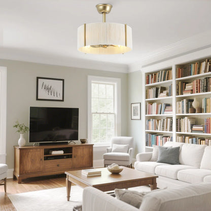 Gold boho fandelier with light installed in a French country living room