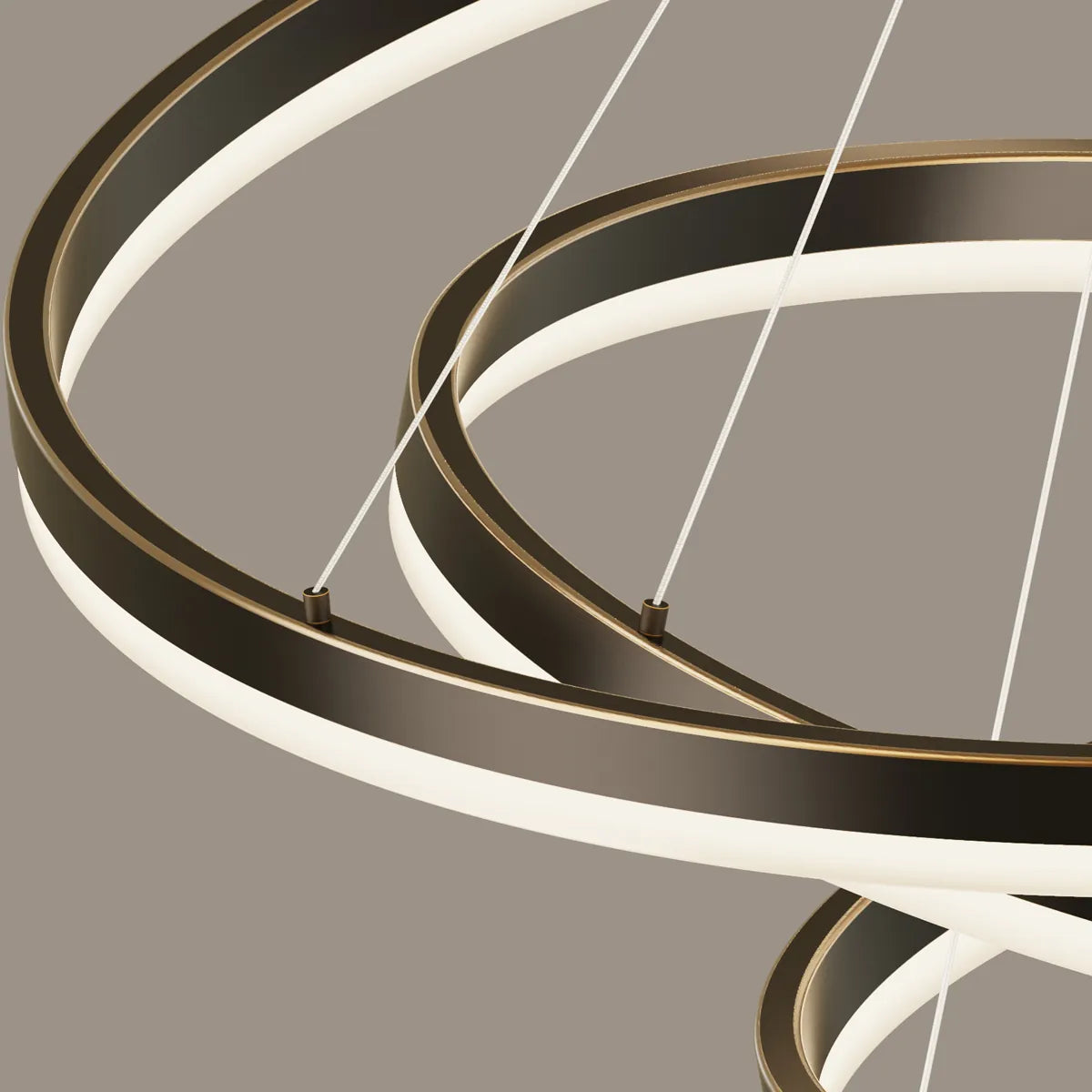 Close-up of blackened copper ring frame, acrylic LED diffuser, and adjustable suspension cable