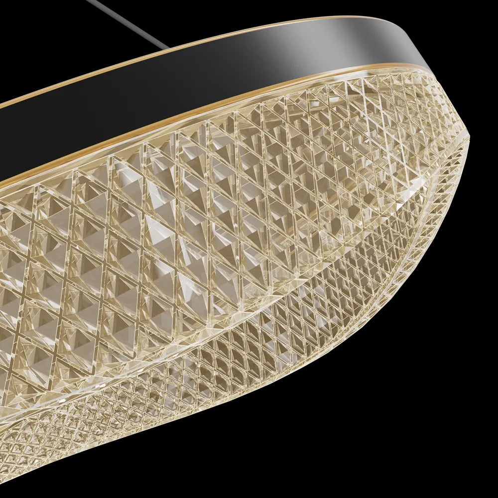 Close-up of blackened copper frame with gold trim and acrylic diffuser