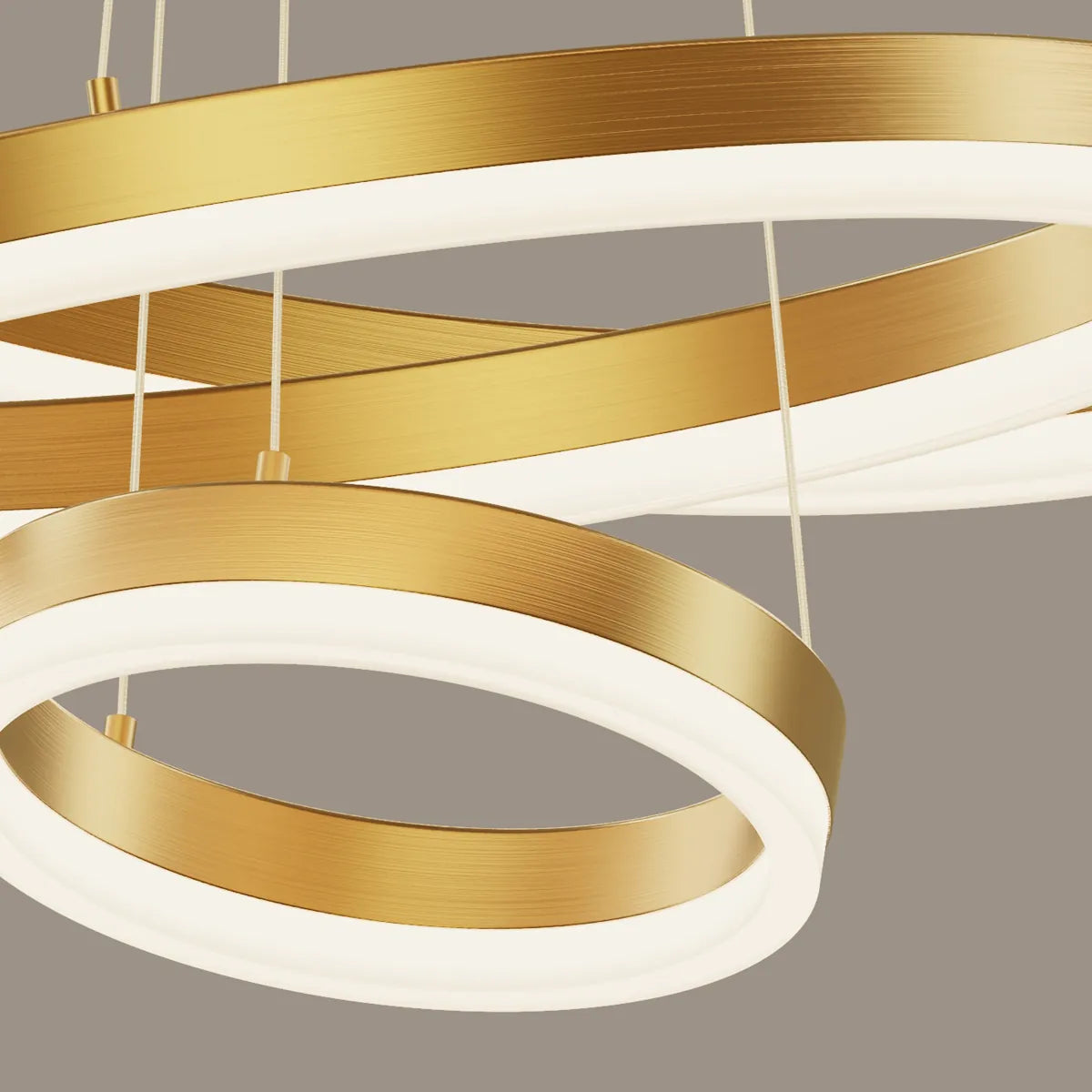 Detail of acrylic diffuser on a gold circular LED chandelier with soft even light