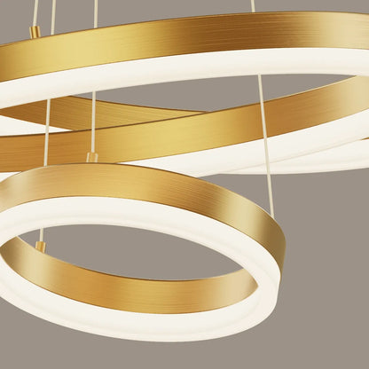 Detail of acrylic diffuser on a gold circular LED chandelier with soft even light