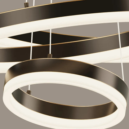 Detail of acrylic diffuser and blackened copper circular frame on a tiered LED chandelier