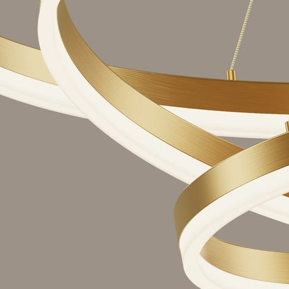 Detail of acrylic diffuser on a gold circular LED chandelier with soft even light