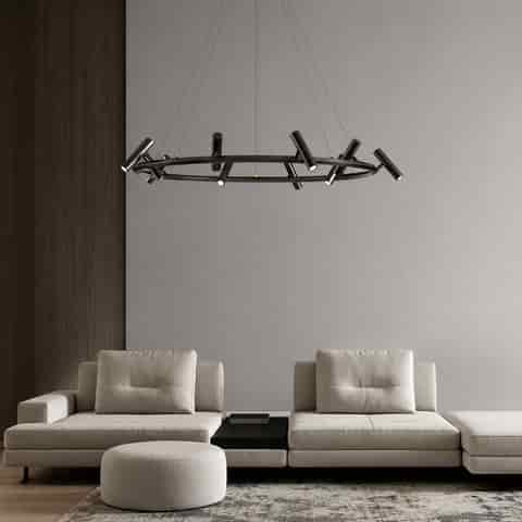 Modern black ring spotlight chandelier above a contemporary living room with adjustable directional metal light heads