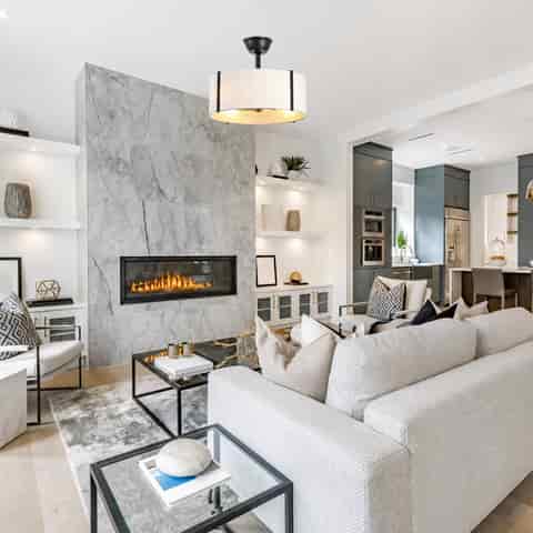 Black drum shade fandelier ceiling fan installed in a modern living room