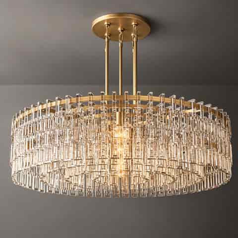Detailed view of clear rectangular chandelier accents surrounding exposed warm light bulbs