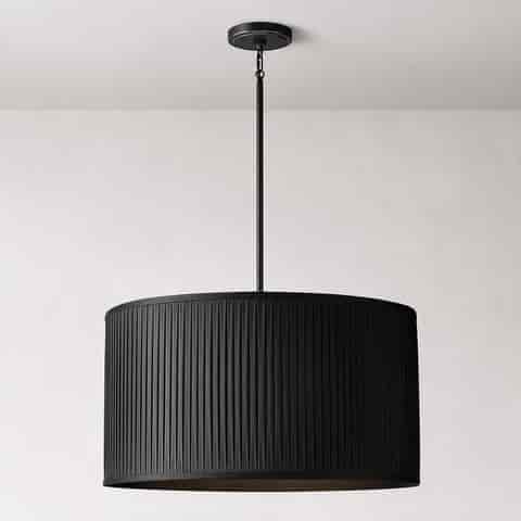 Black pleated fabric drum pendant light with black metal downrod and ceiling canopy