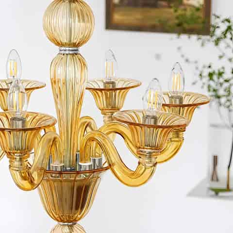 Amber glass 8 arm chandelier with sculptural ribbed glass body