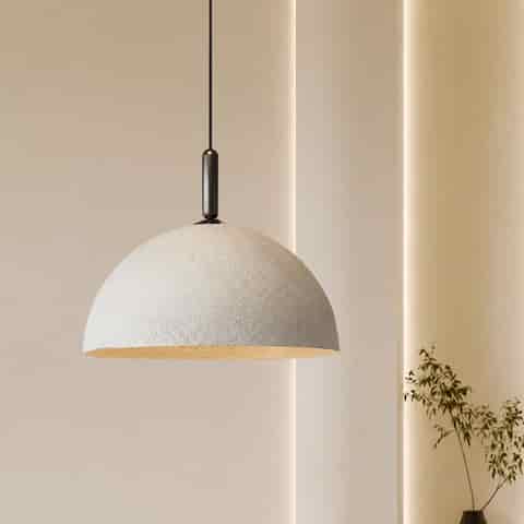 White textured dome pendant light with black fitting in a warm modern interior