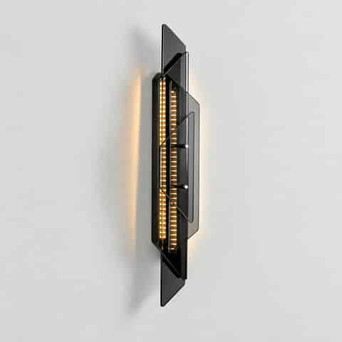 Modern geometric black LED wall sconce with layered clear glass panels and warm integrated lighting
