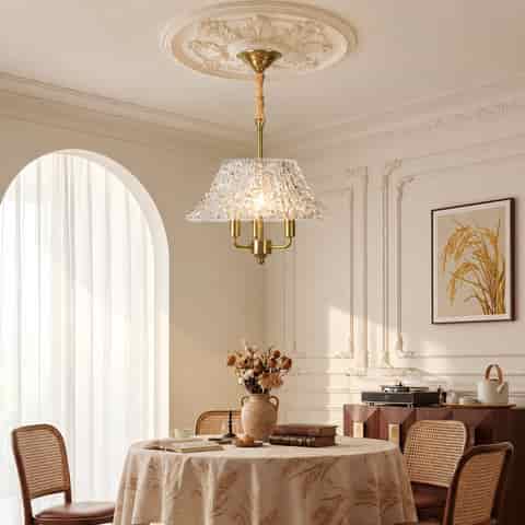 Gold Glass Pendant Light in a Classic Interior with Decorative Ceiling Molding and Warm Ambient Lighting
