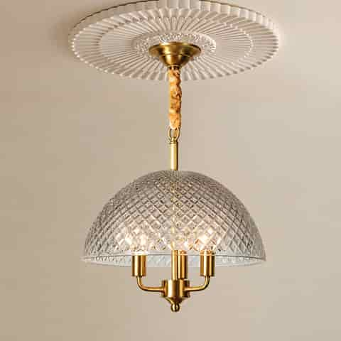 Gold Glass Pendant Chandelier in a Traditional Room with Framed Artwork and Large Windows