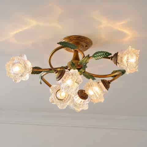 Multi light vintage floral ceiling fixture with clear textured flower shades and branching botanical metal arms