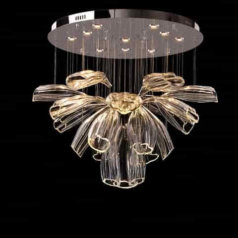 Illuminated clear flower chandelier with warm reflections across layered petals and circular