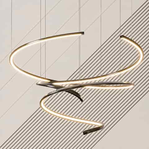 Electroplated gold sculptural spiral LED chandelier installed in a warm modern interior with cascading curved light forms