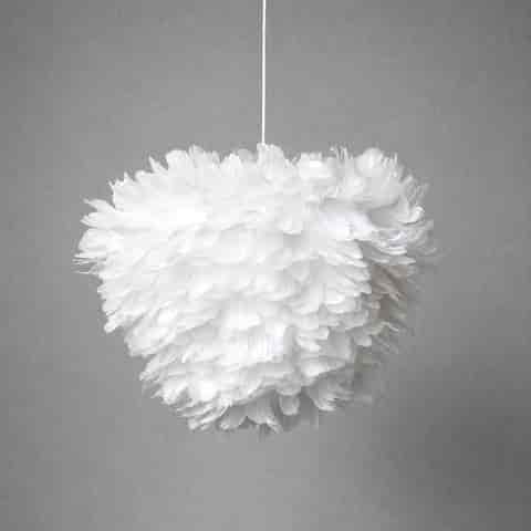 White feather pendant light with full layered shade shown unlit against a gray background
